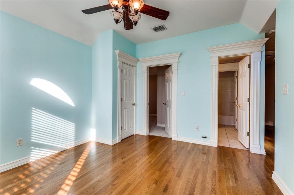 5520 Dido Hicks Road Fort Worth, TX 76179 - Photo 21 of 33 wooden floor in an empty room with a window