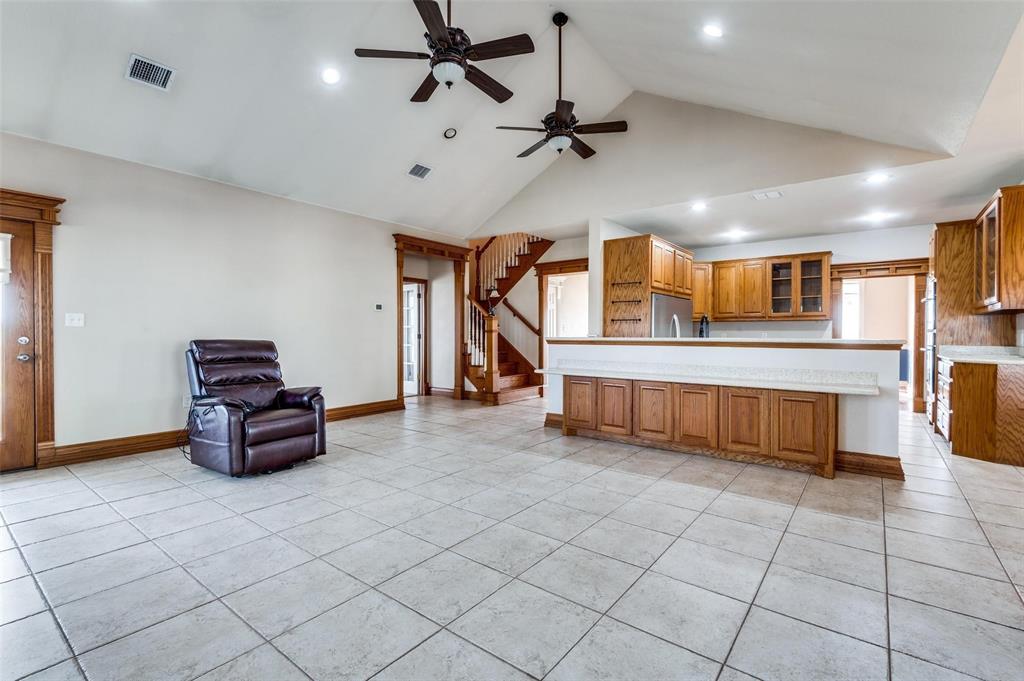 5520 Dido Hicks Road Fort Worth, TX 76179 - Photo 9 of 33 a living room with furniture and a chandelier