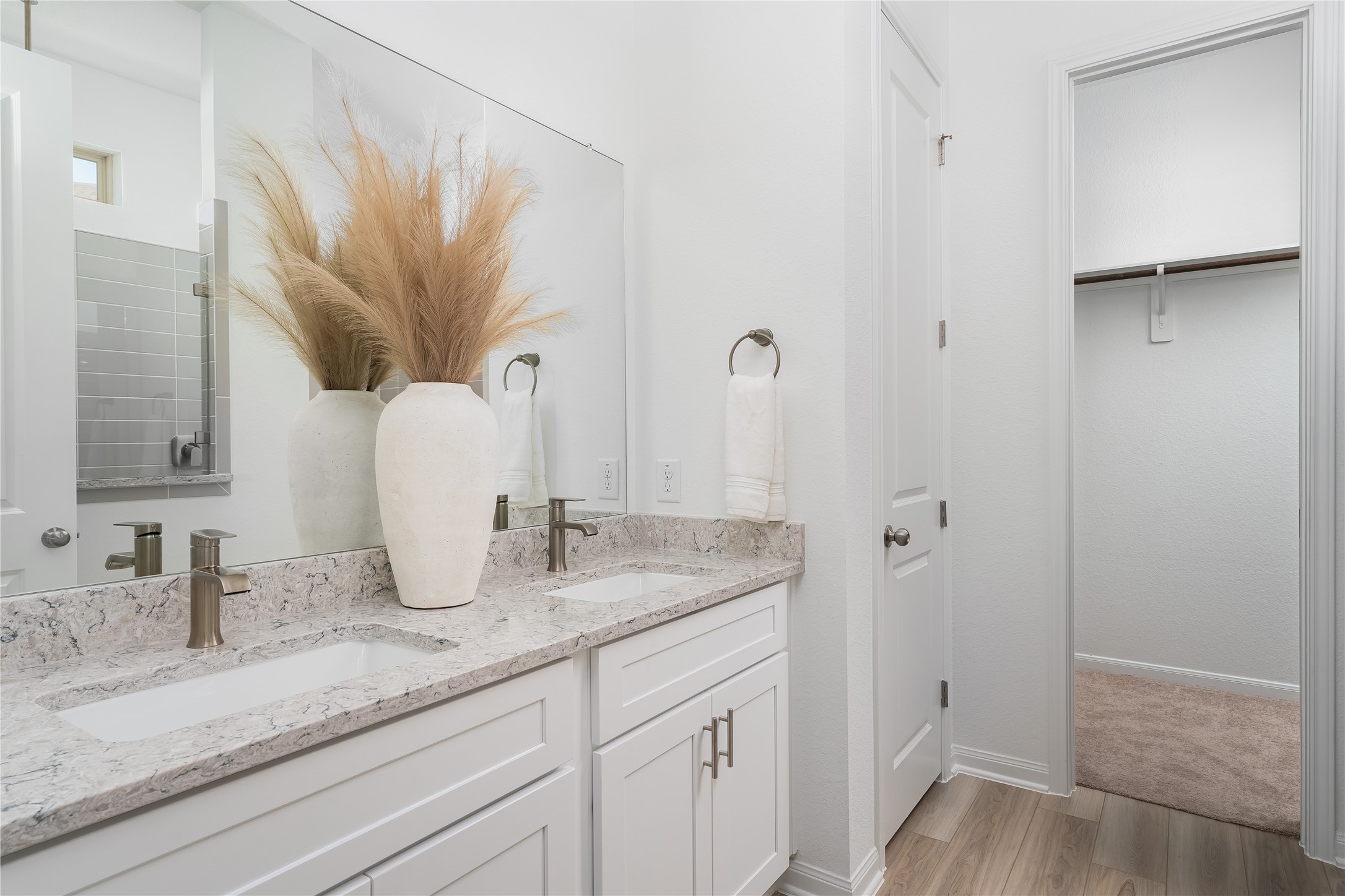 15159 Wild Gully Way Conroe, TX 77302 - Photo 16 of 33 a bathroom with a granite countertop sink and a mirror