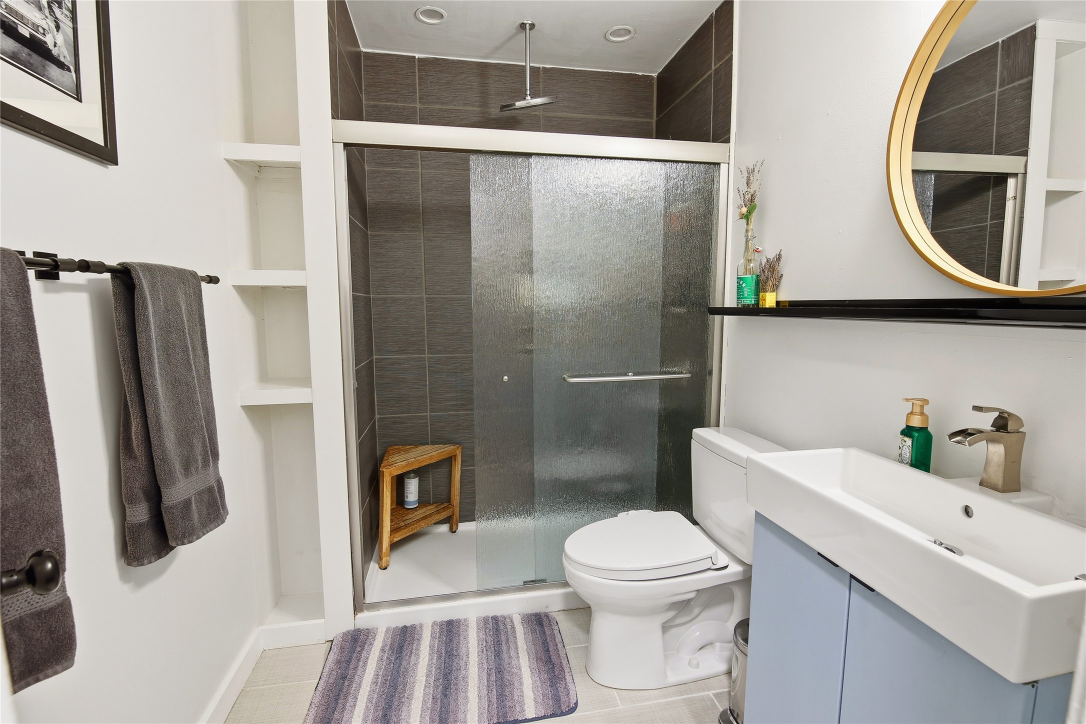 6001 Leisure Run Road Austin, TX 78745 - Photo 17 of 24 Updated shower with high shower head and tile walls