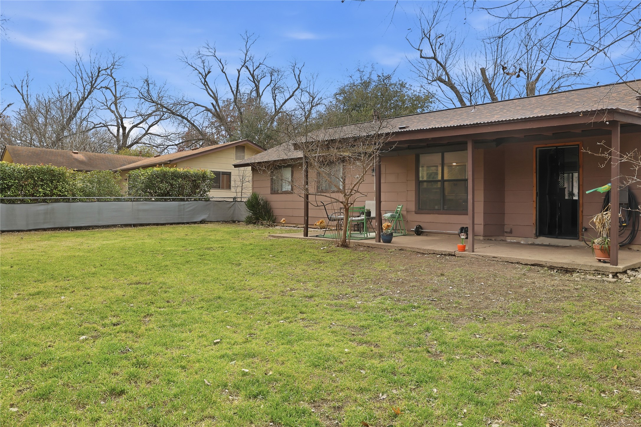 6001 Leisure Run Road Austin, TX 78745 - Photo 20 of 24 Back yard and covered patio