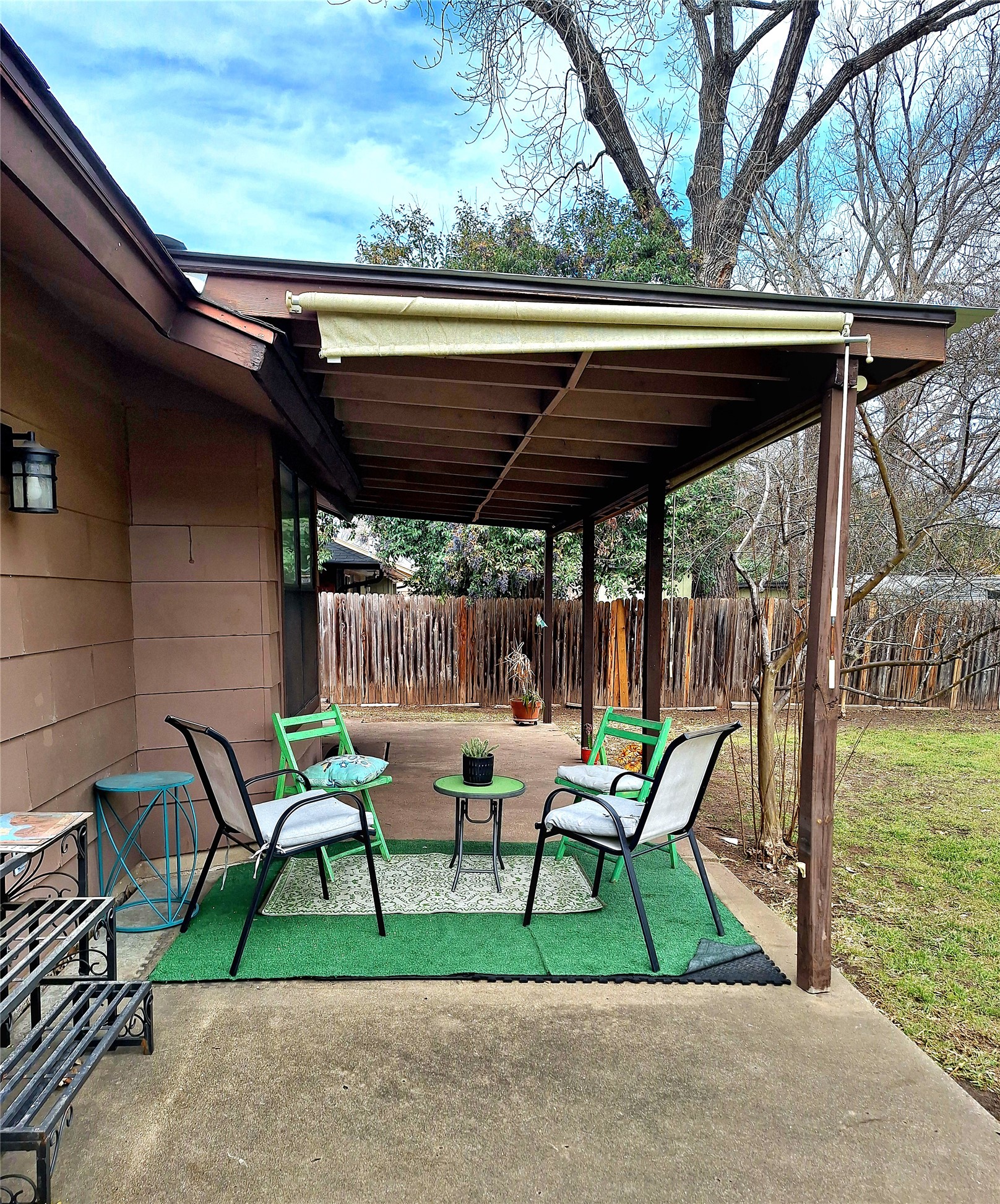 6001 Leisure Run Road Austin, TX 78745 - Photo 23 of 24 Covered patio and sitting area for entertaining