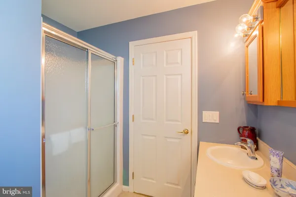 a bedroom with a bed and furniture