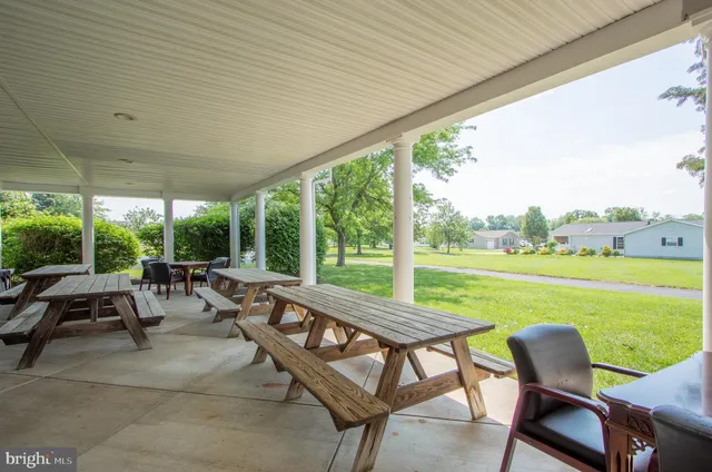 a garden view with a seating space