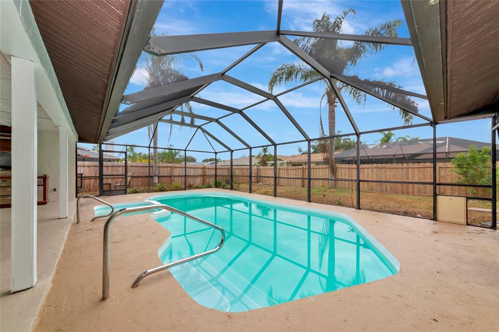 4656 Alexander Pope Lane Sarasota, FL 34241 - Photo 39 of 42 a view of a backyard