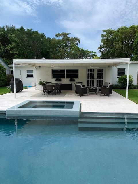 839 Upland Road West Palm Beach, FL 33401 - Photo 5 of 17 Pool to patio