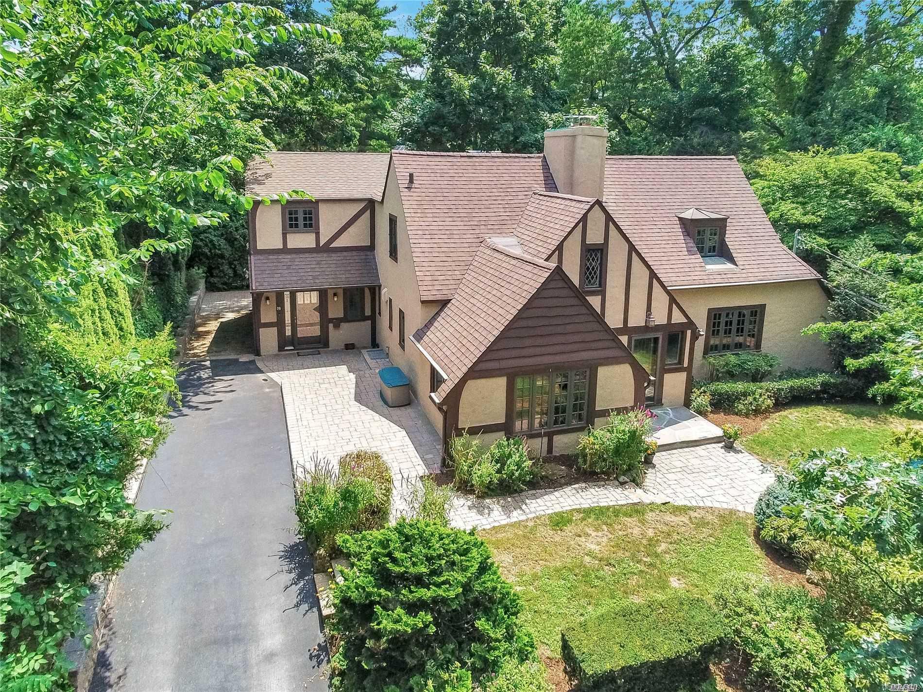 70 Litchfield Road Port Washington, NY 11050 - Photo 1 of 1 an aerial view of a house
