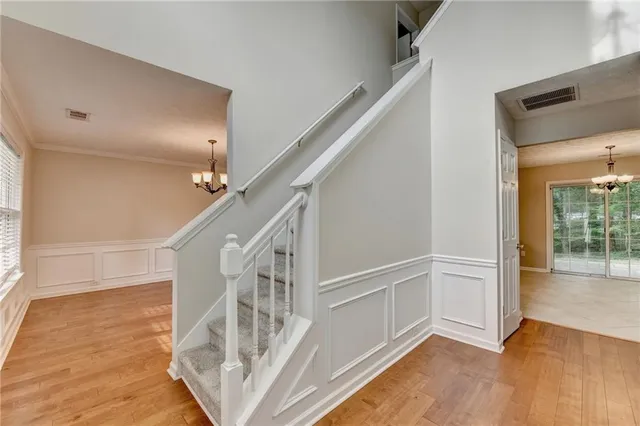 a view of entryway with wooden floor
