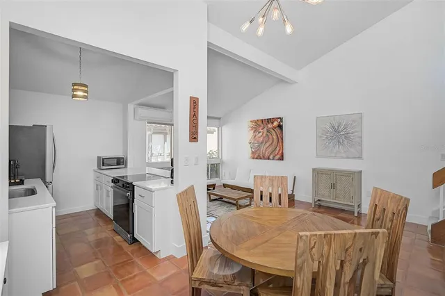 a bathroom with a sink mirror vanity and toilet