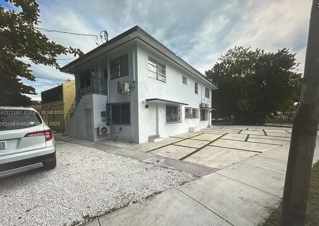 an aerial view of a highlighted house