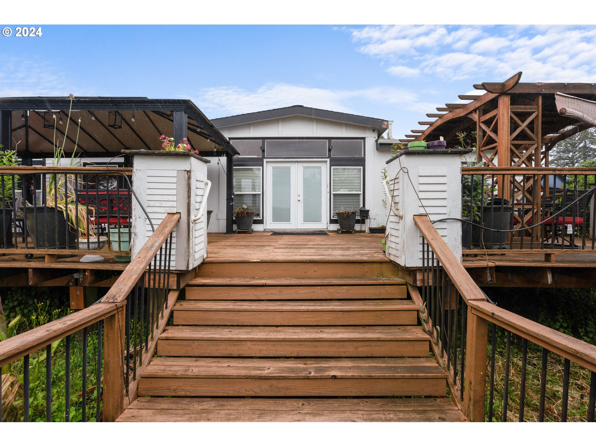 30190 South Oswalt Road Colton, OR 97017 - Photo 26 of 33 a view of a house with wooden deck