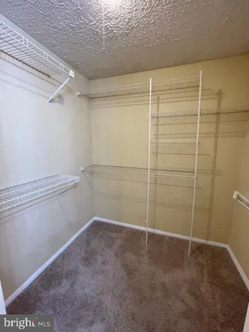 a view of a room with shelves