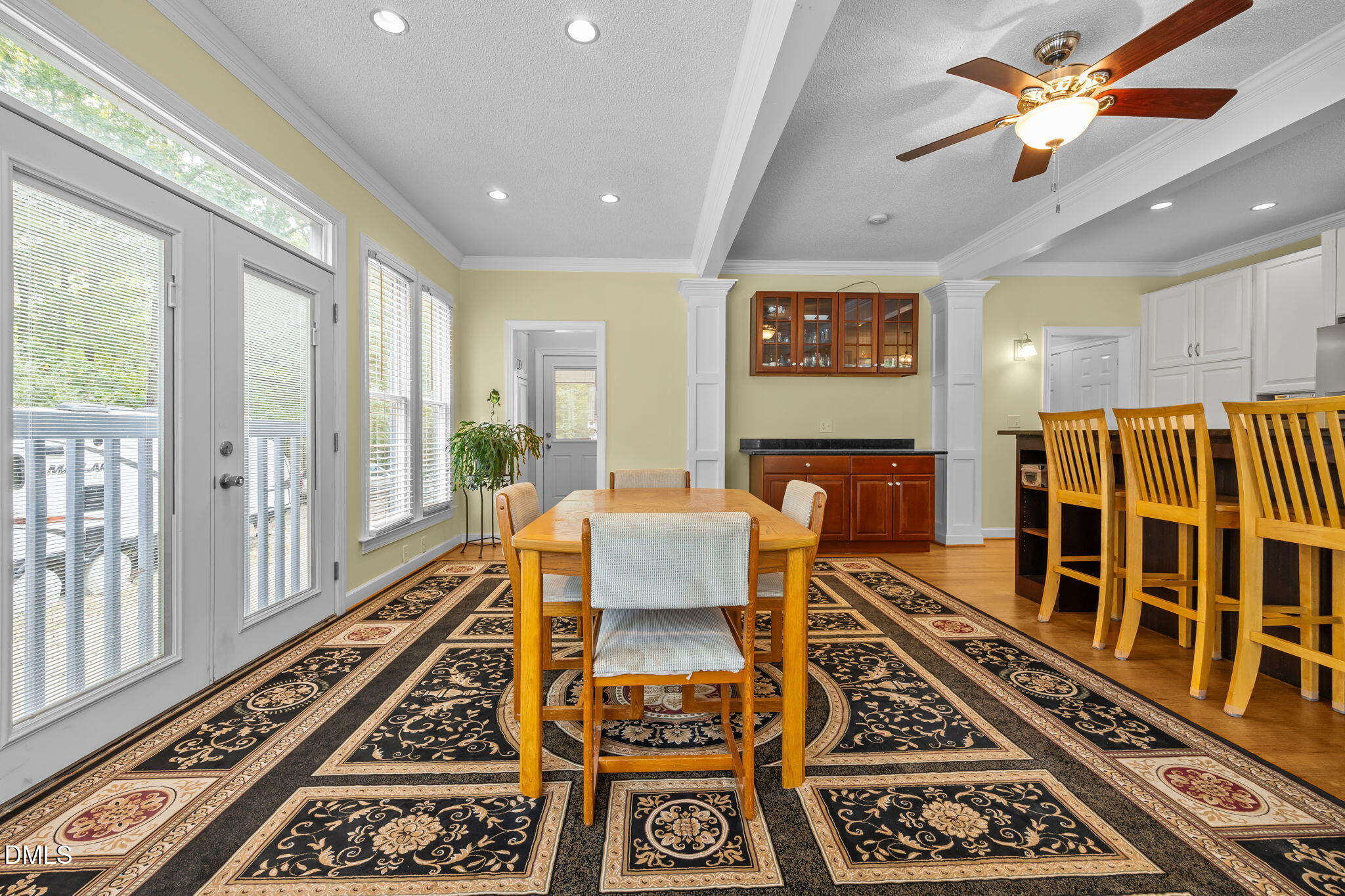 8641 Buffaloe Road Knightdale, NC 27545 - Photo 12 of 52 a living room with furniture rug and wooden floor