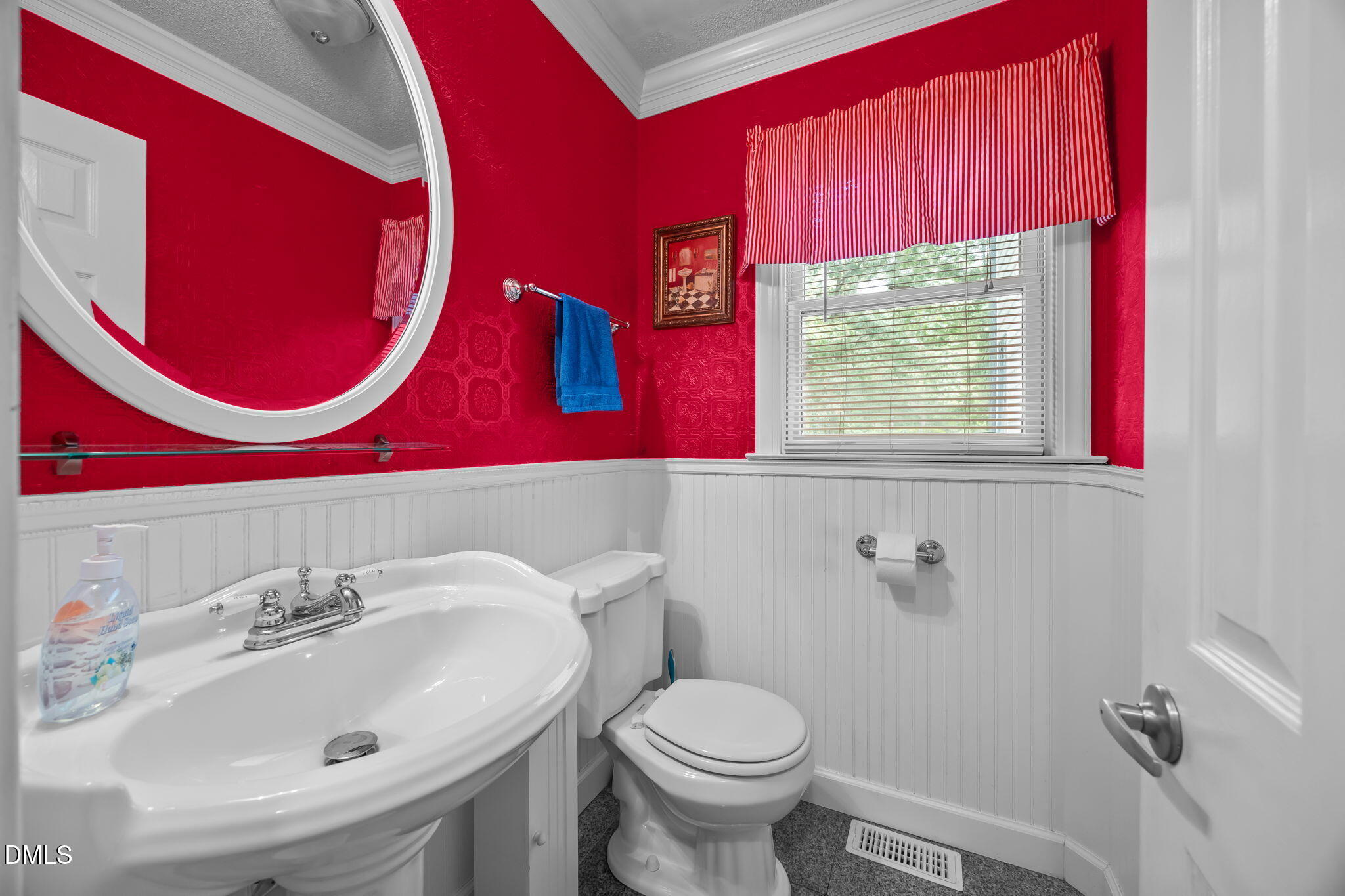 8641 Buffaloe Road Knightdale, NC 27545 - Photo 21 of 52 a bathroom with a sink and a mirror