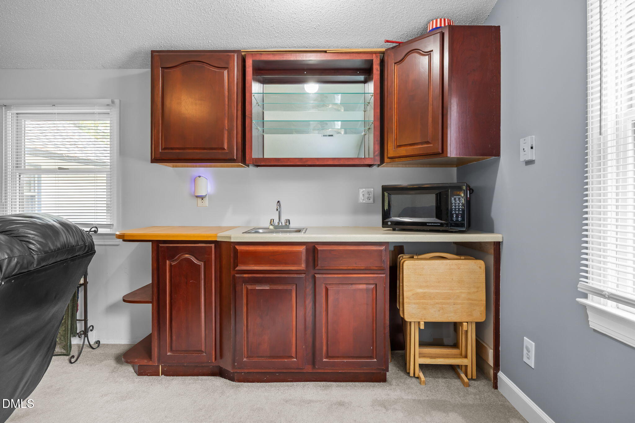 8641 Buffaloe Road Knightdale, NC 27545 - Photo 35 of 52 a kitchen with stainless steel appliances granite countertop a sink and cabinets