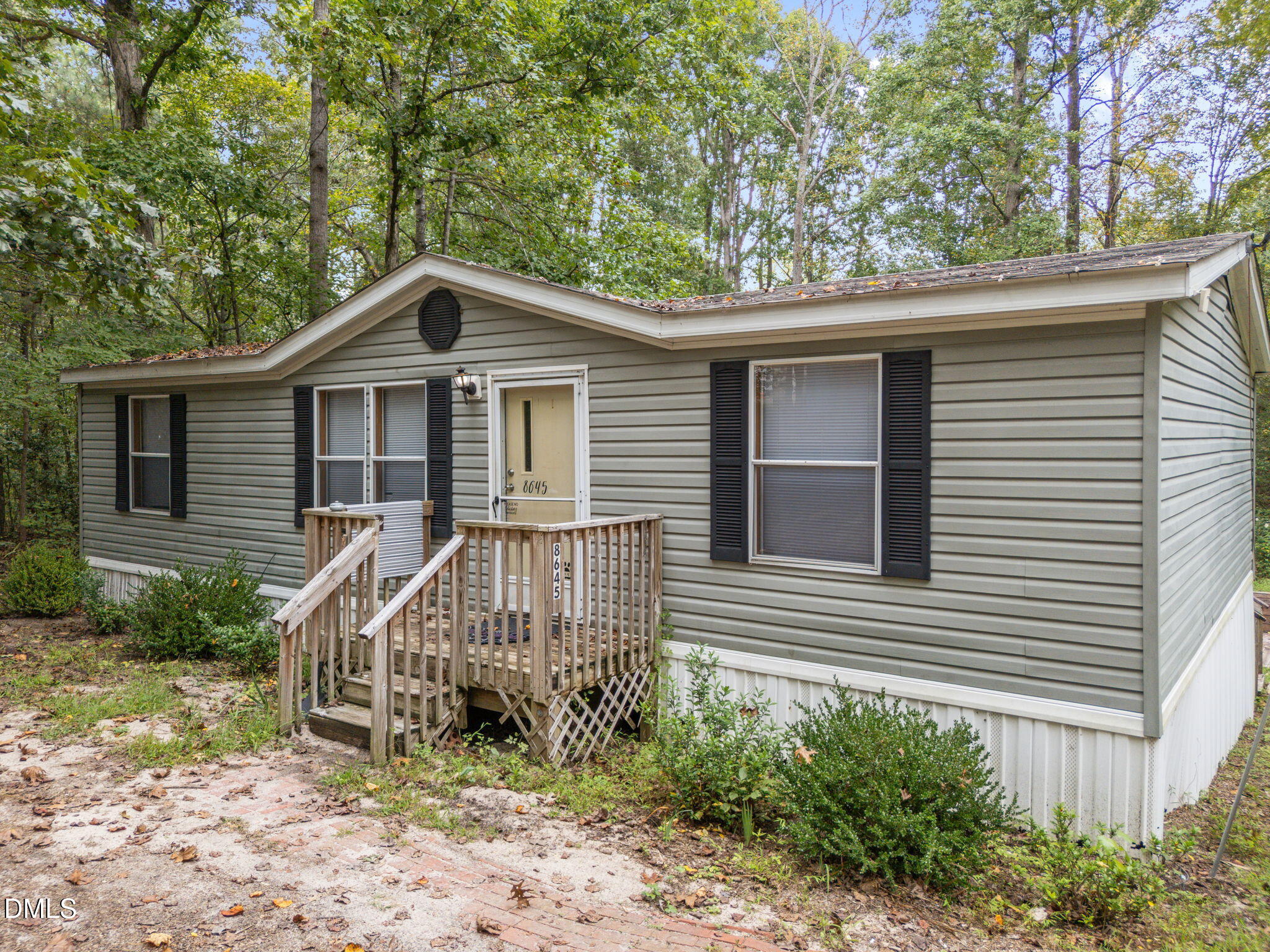 8641 Buffaloe Road Knightdale, NC 27545 - Photo 39 of 52 a front view of a house with a garden