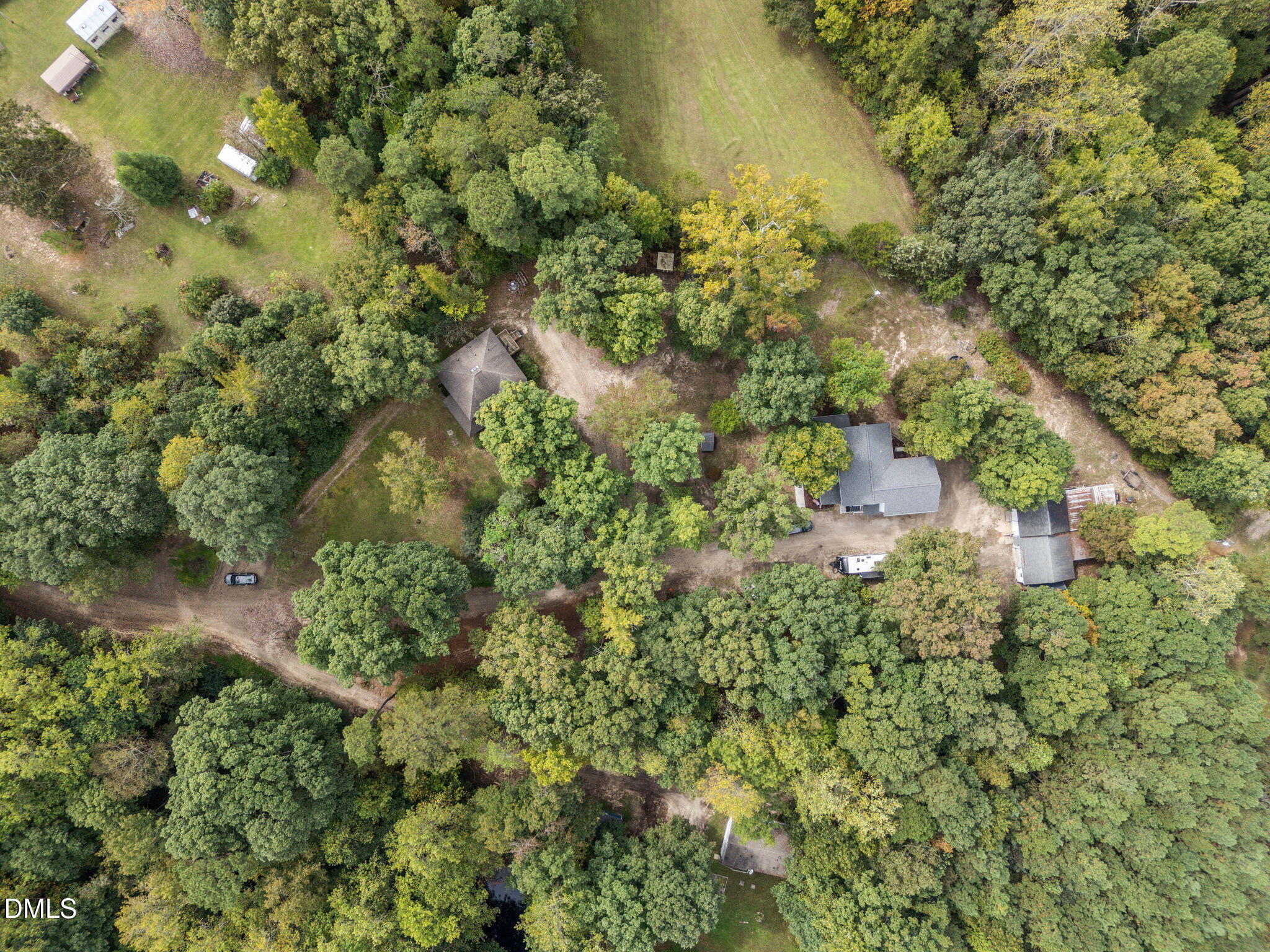 8641 Buffaloe Road Knightdale, NC 27545 - Photo 43 of 52 an aerial view of residential houses with outdoor space and trees
