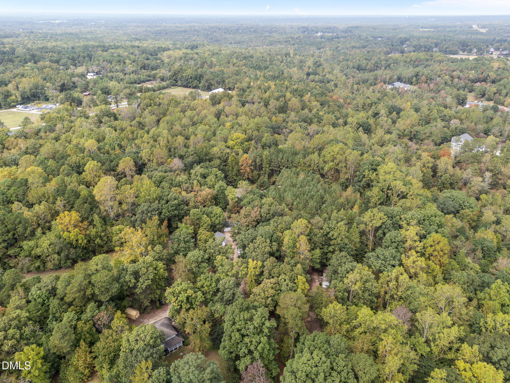 8641 Buffaloe Road Knightdale, NC 27545 - Photo 46 of 52 an aerial view of residential houses with outdoor space and trees