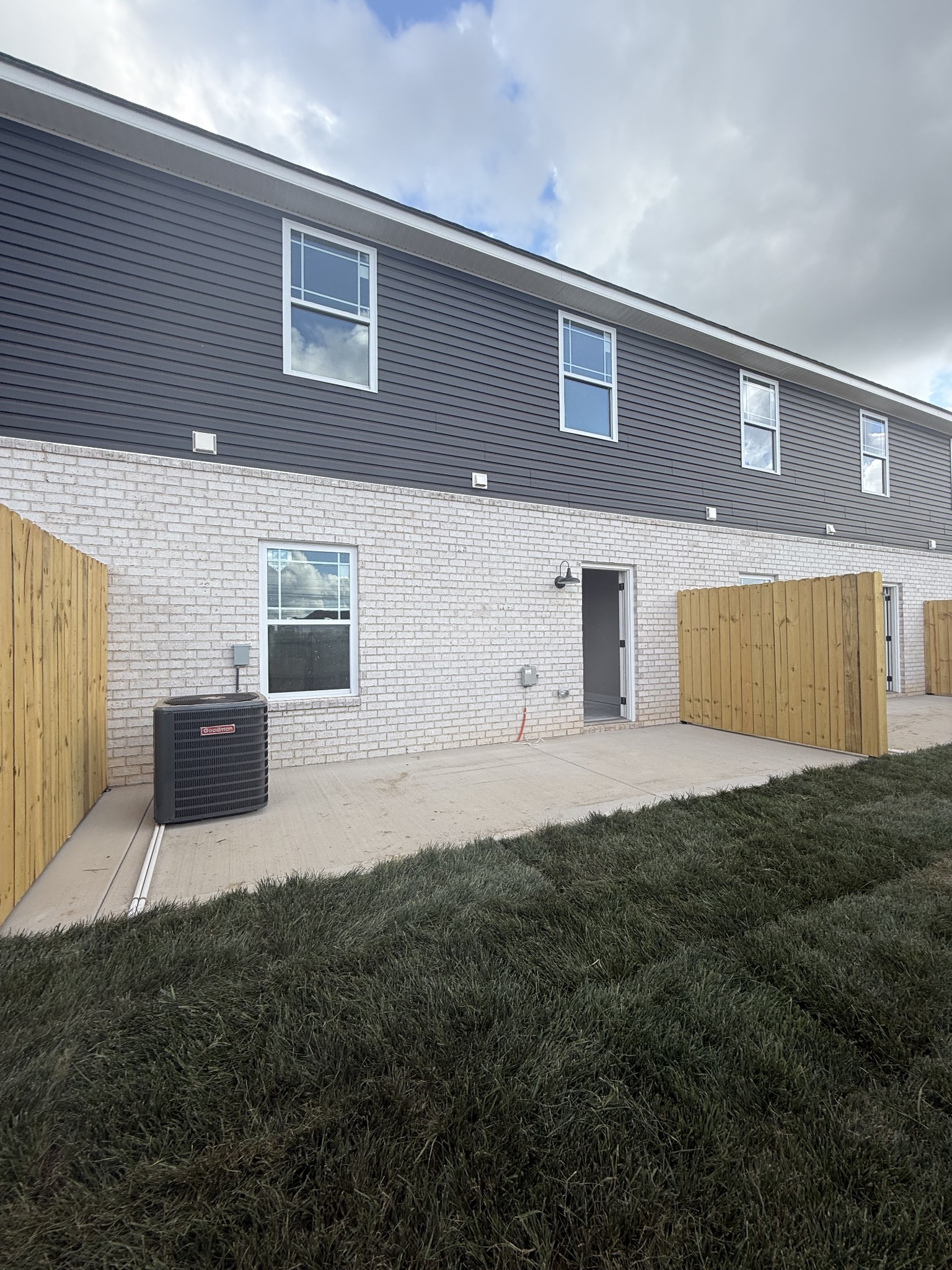 206 Fallow Drive Clarksville, TN 37040 - Photo 25 of 28 a view of a house with backyard and a garage