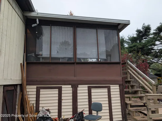 a bed room with a bed and a tv