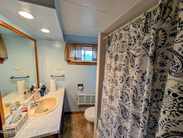 a room with furniture and a chandelier