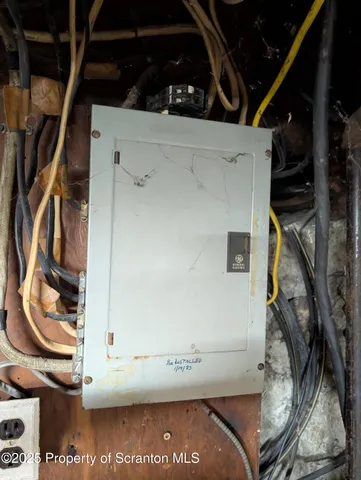 a view of cabinets and wooden floor