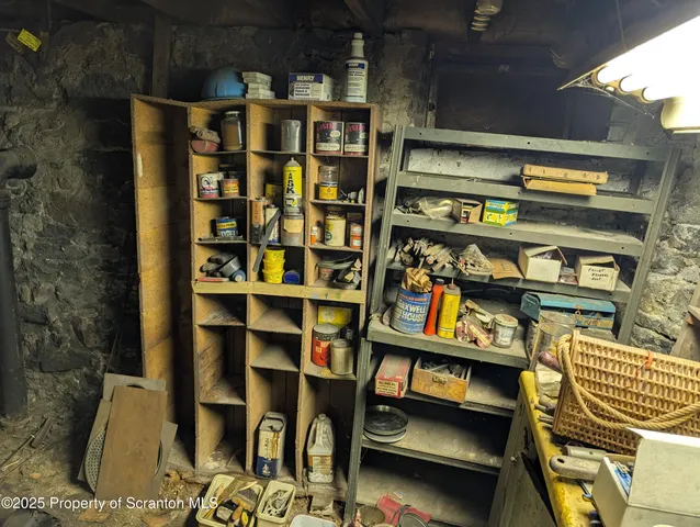 a view of house with backyard and trees