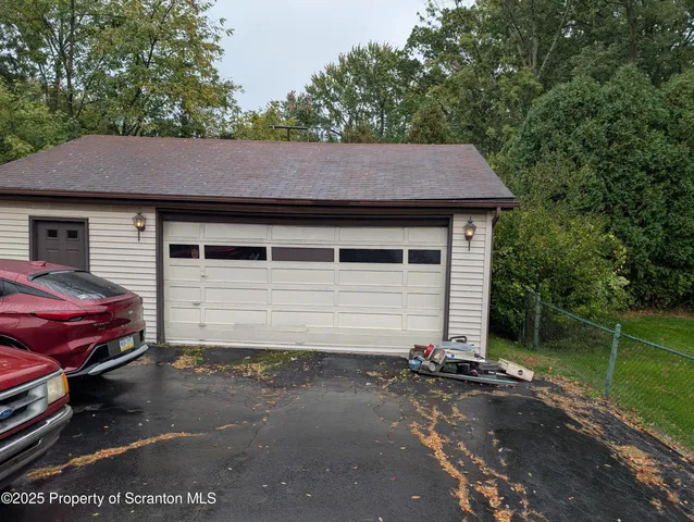 a view of a house with a white door