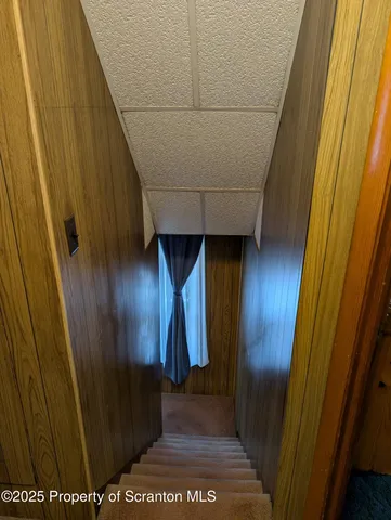 a view of room with window and couch