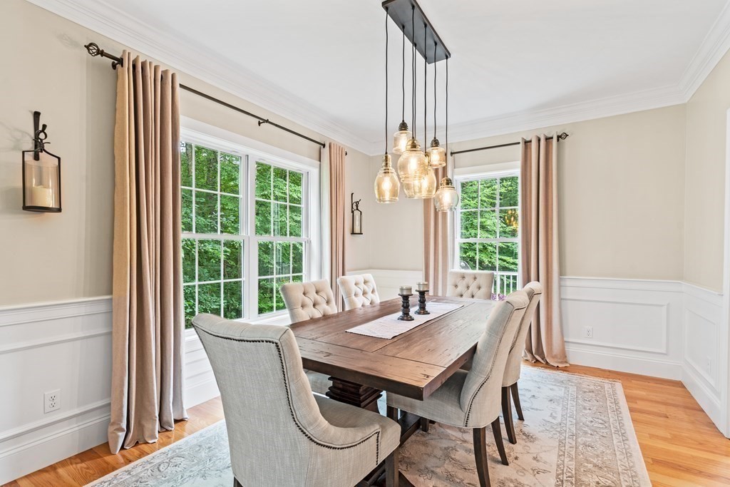 22 Randall Road Stow, MA 01775 - Photo 11 of 38 a view of a dining room with furniture window and wooden floor