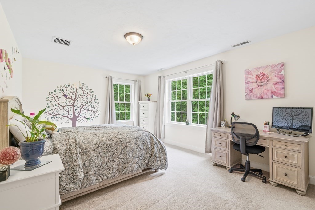 22 Randall Road Stow, MA 01775 - Photo 24 of 38 a bedroom with a bed and a window