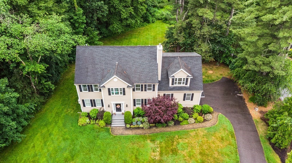 22 Randall Road Stow, MA 01775 - Photo 3 of 38 front view of a house with a yard