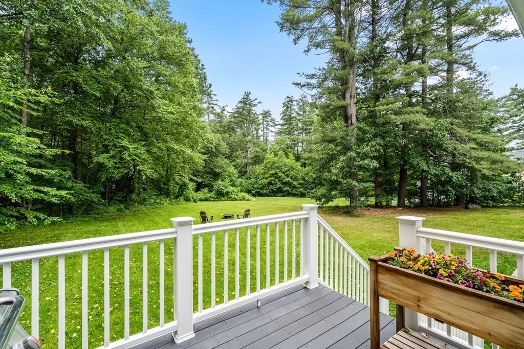 22 Randall Road Stow, MA 01775 - Photo 32 of 38 a view of a balcony with wooden floor and fence