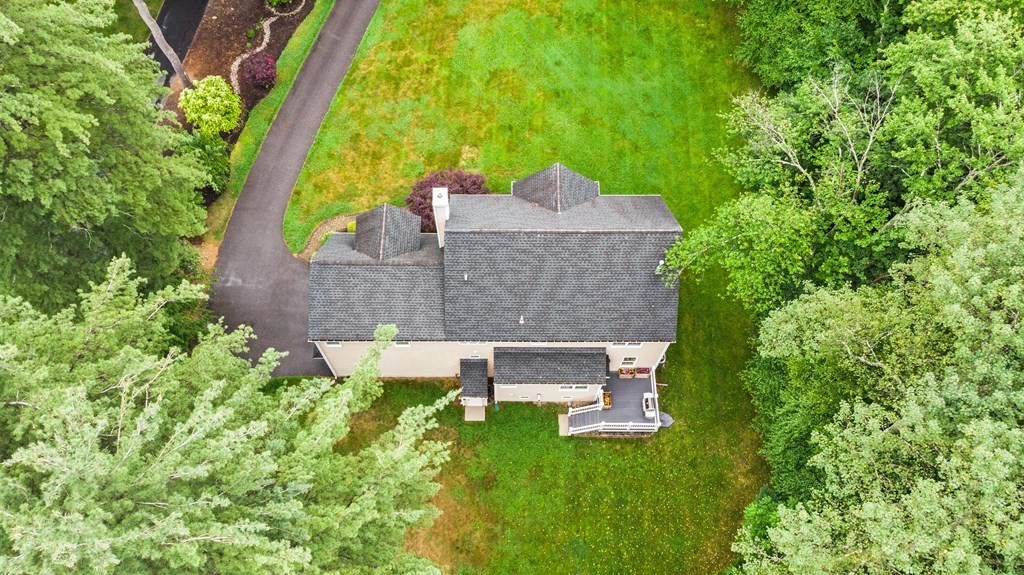22 Randall Road Stow, MA 01775 - Photo 4 of 38 a aerial view of a house with a yard
