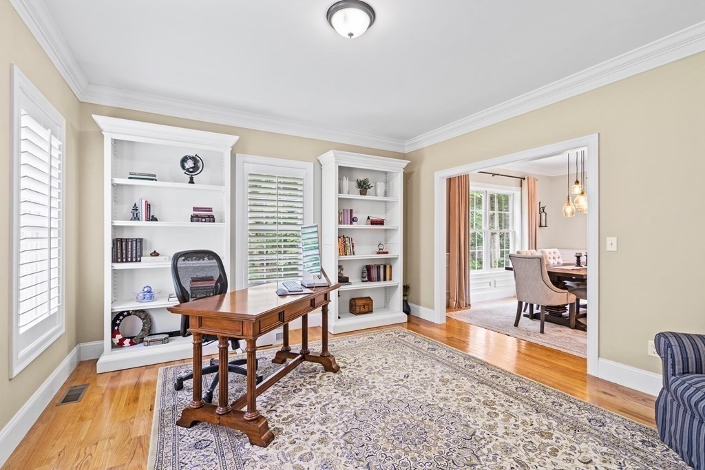 22 Randall Road Stow, MA 01775 - Photo 9 of 38 a living room with furniture a rug and a window