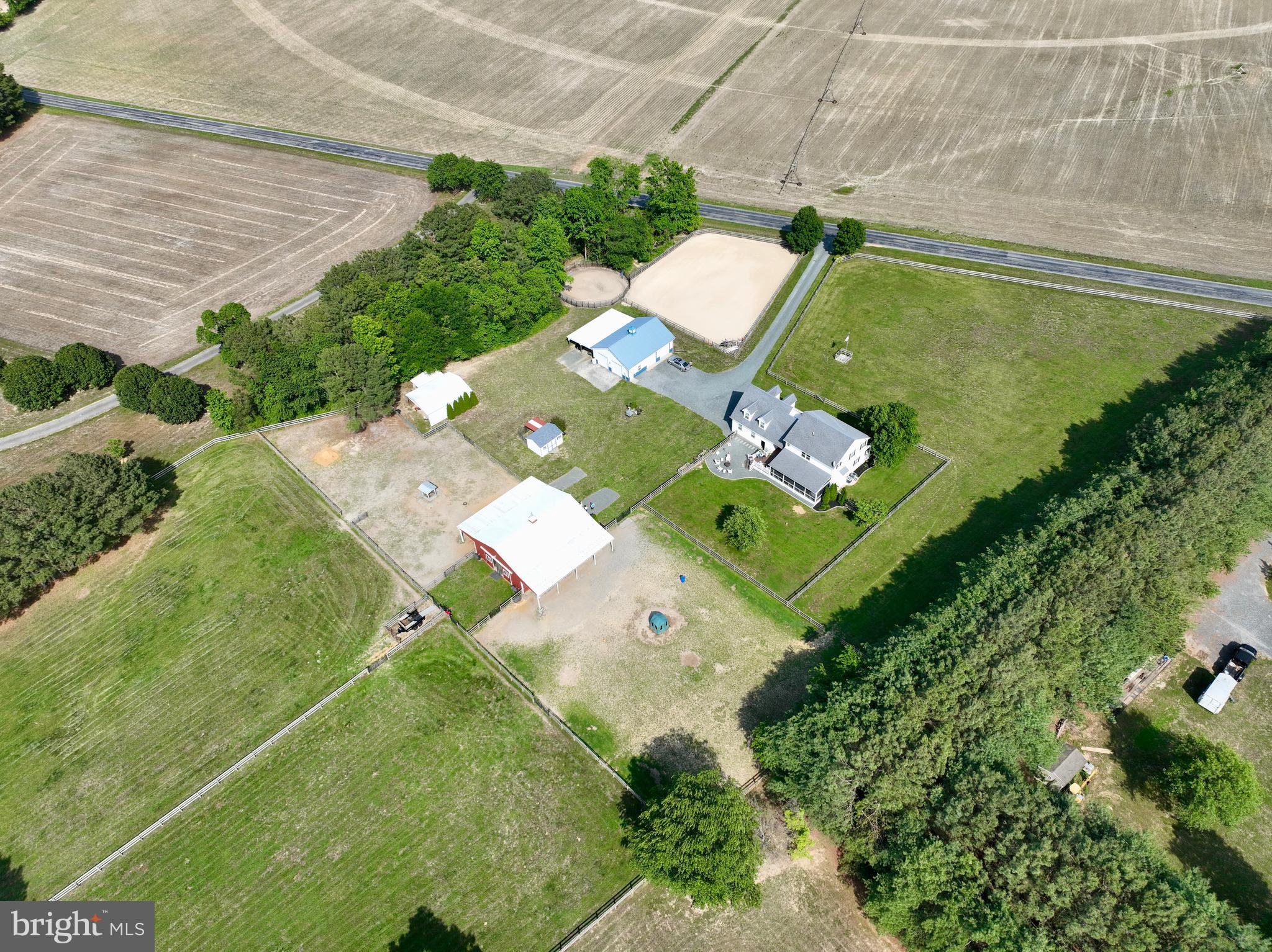 12136 Holly Road Ridgely, MD 21660 - Photo 128 of 136 an aerial view of a house with a garden