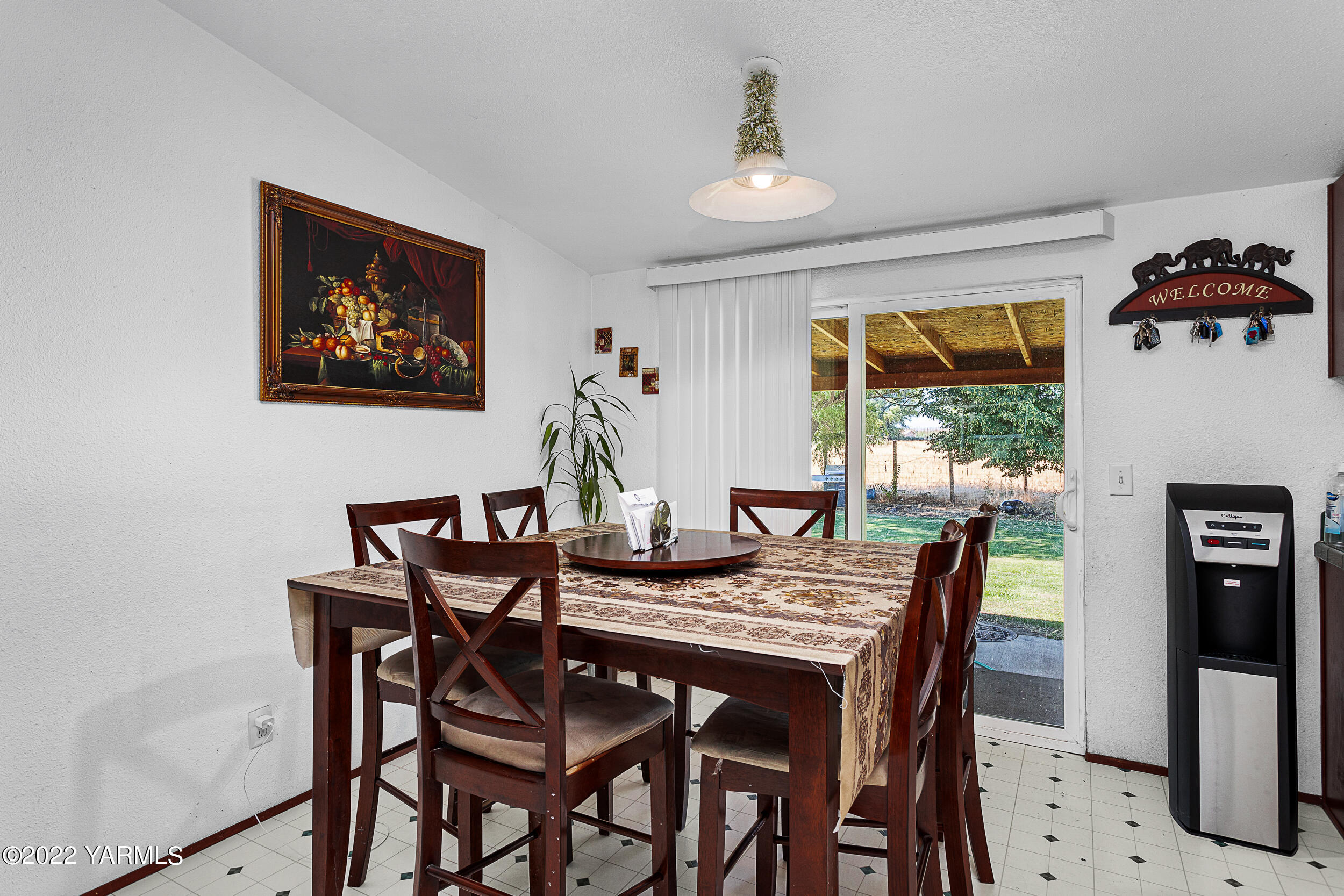 221 Rowberry Way Toppenish, WA 98948 - Photo 22 of 31 a view of a dining room with furniture window and outside view