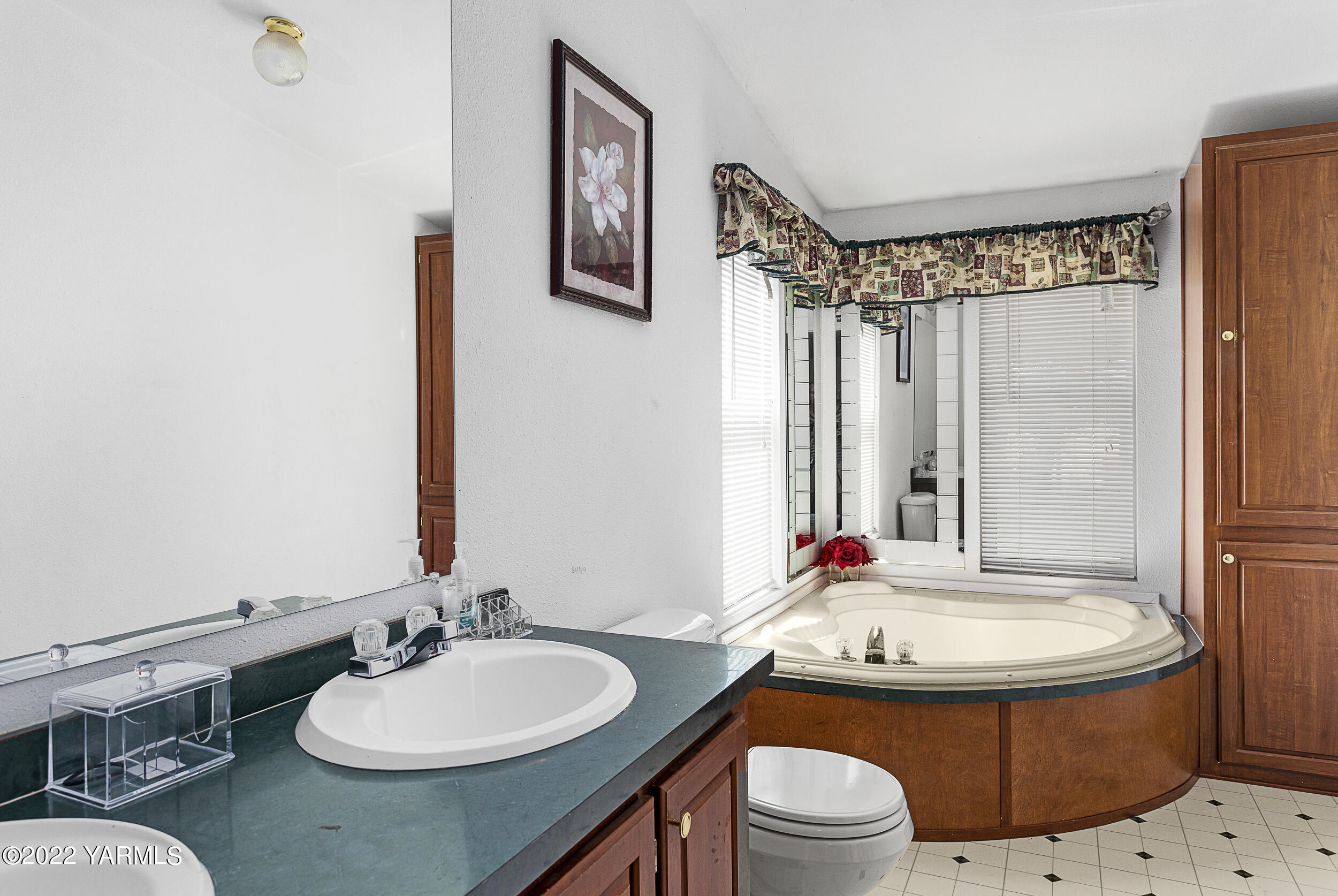 221 Rowberry Way Toppenish, WA 98948 - Photo 25 of 31 a bathroom with a granite countertop sink toilet and shower