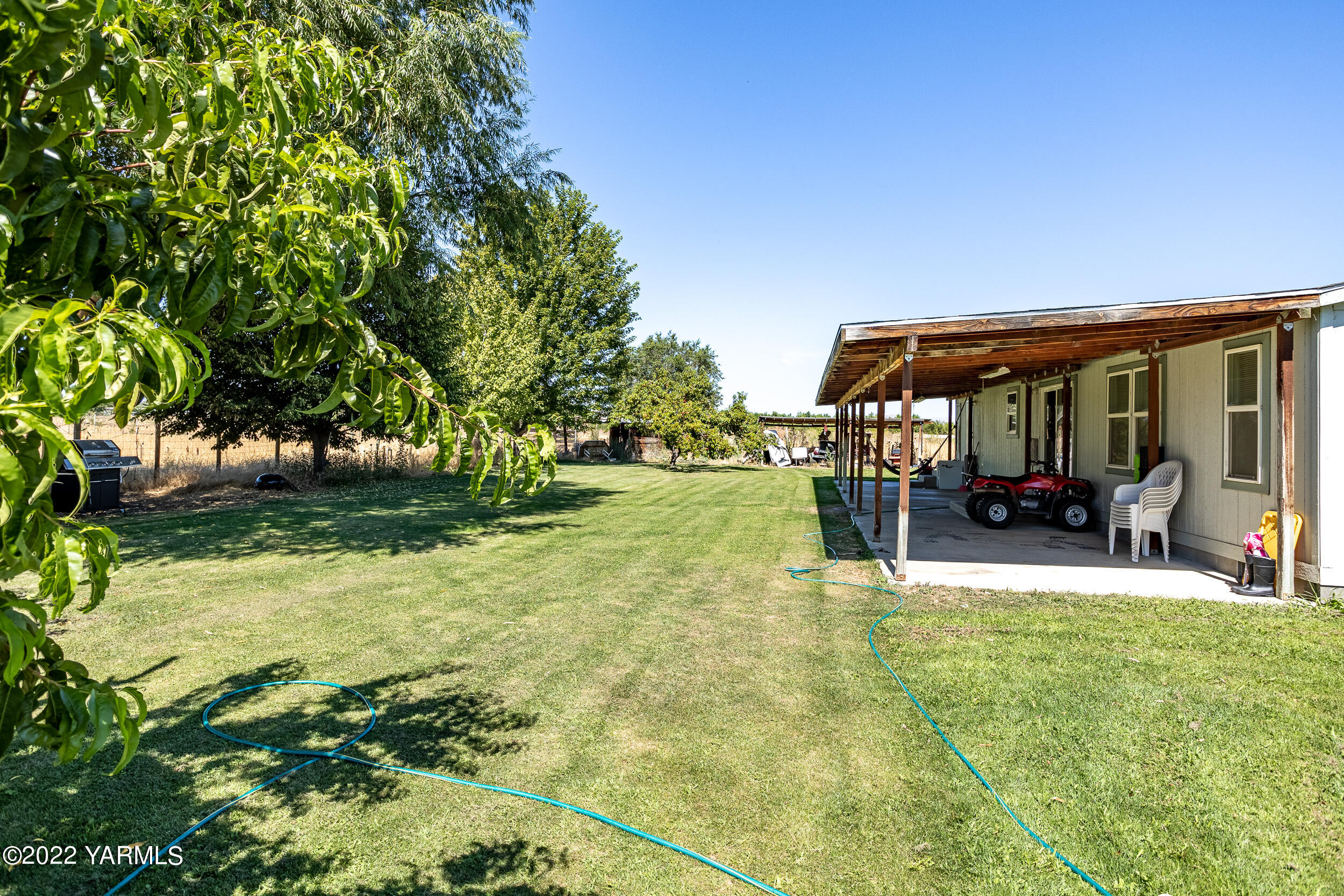 221 Rowberry Way Toppenish, WA 98948 - Photo 30 of 31 a view of yard with patio