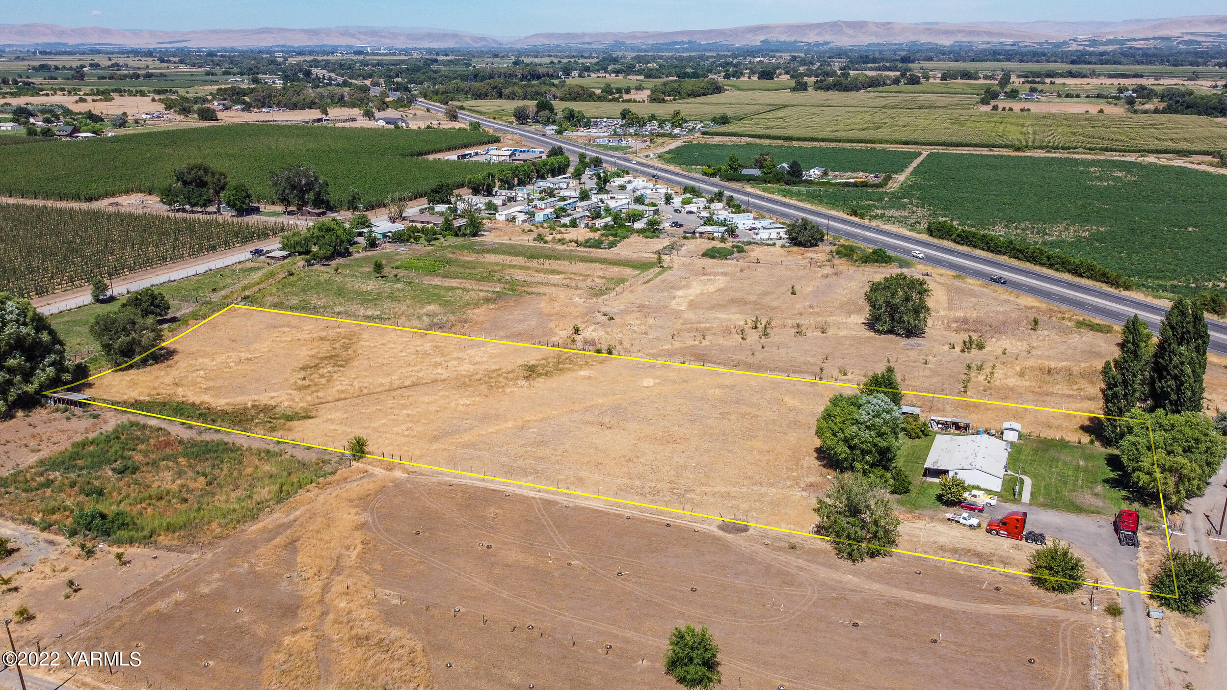 221 Rowberry Way Toppenish, WA 98948 - Photo 5 of 31 an aerial view of a house with a yard lake view and mountain view