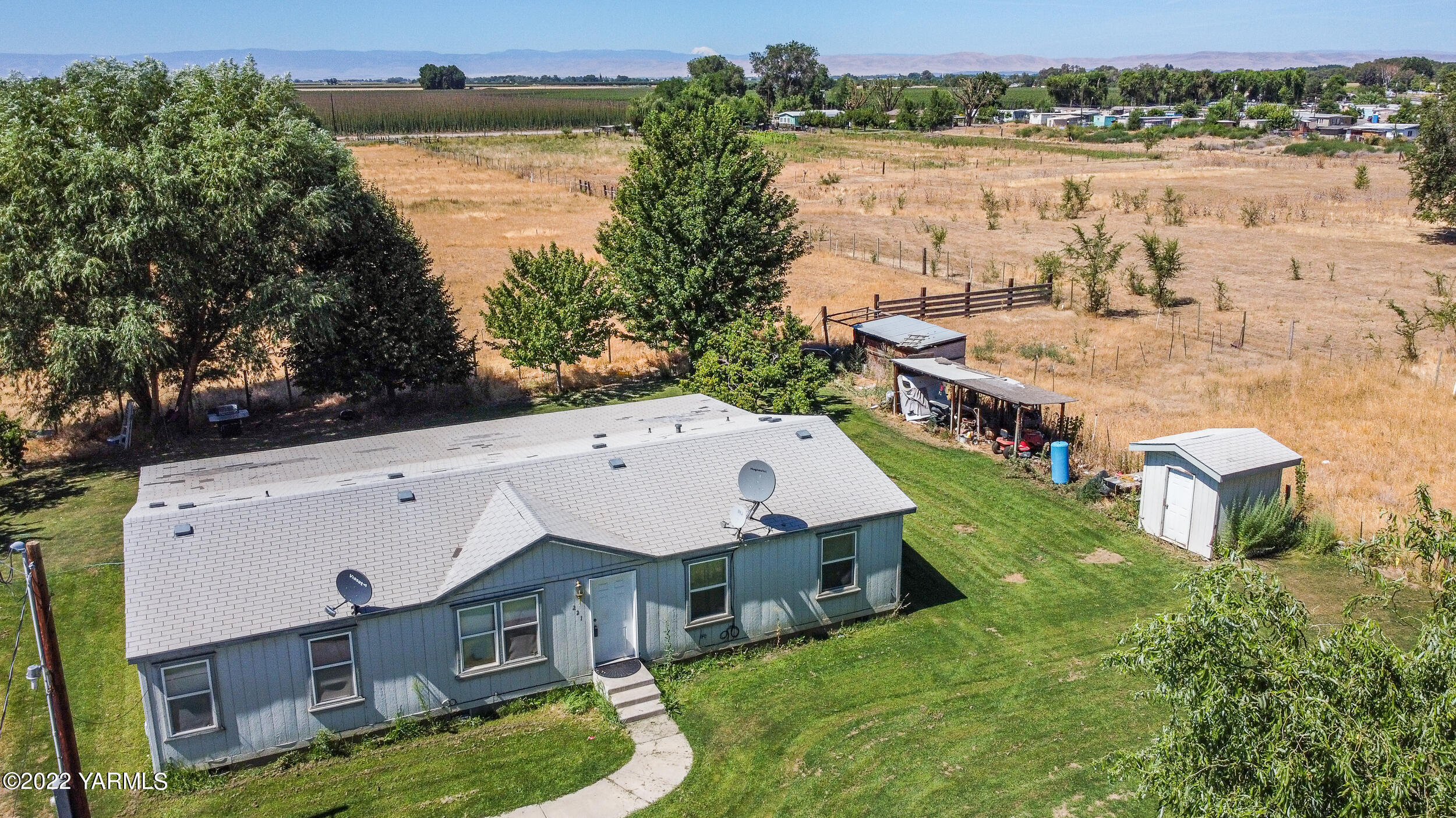221 Rowberry Way Toppenish, WA 98948 - Photo 10 of 31 an aerial view of a house with outdoor space and lake view