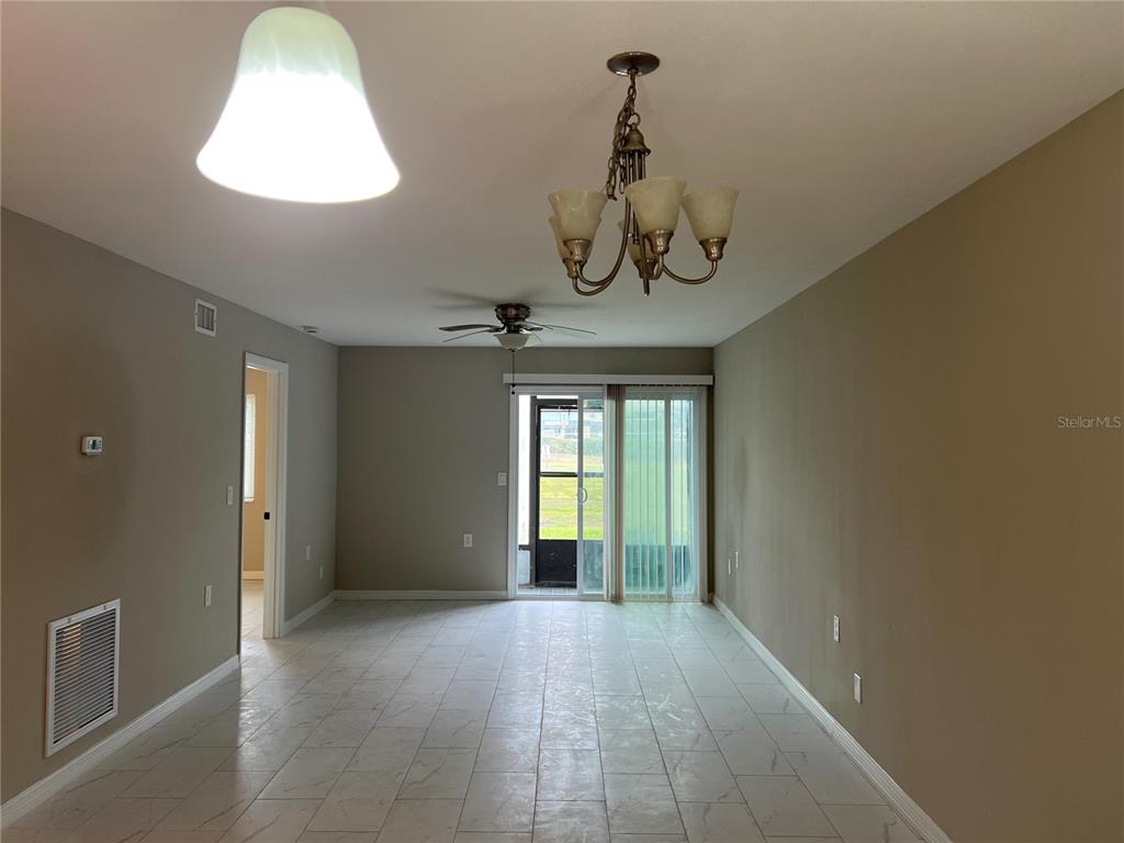 39132 County Road 54, Unit 2064 Zephyrhills, FL 33542 - Photo 5 of 20 a view of a room with a window and furniture