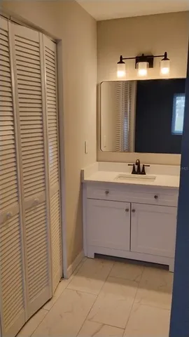 a white toilet and shower in a bathroom