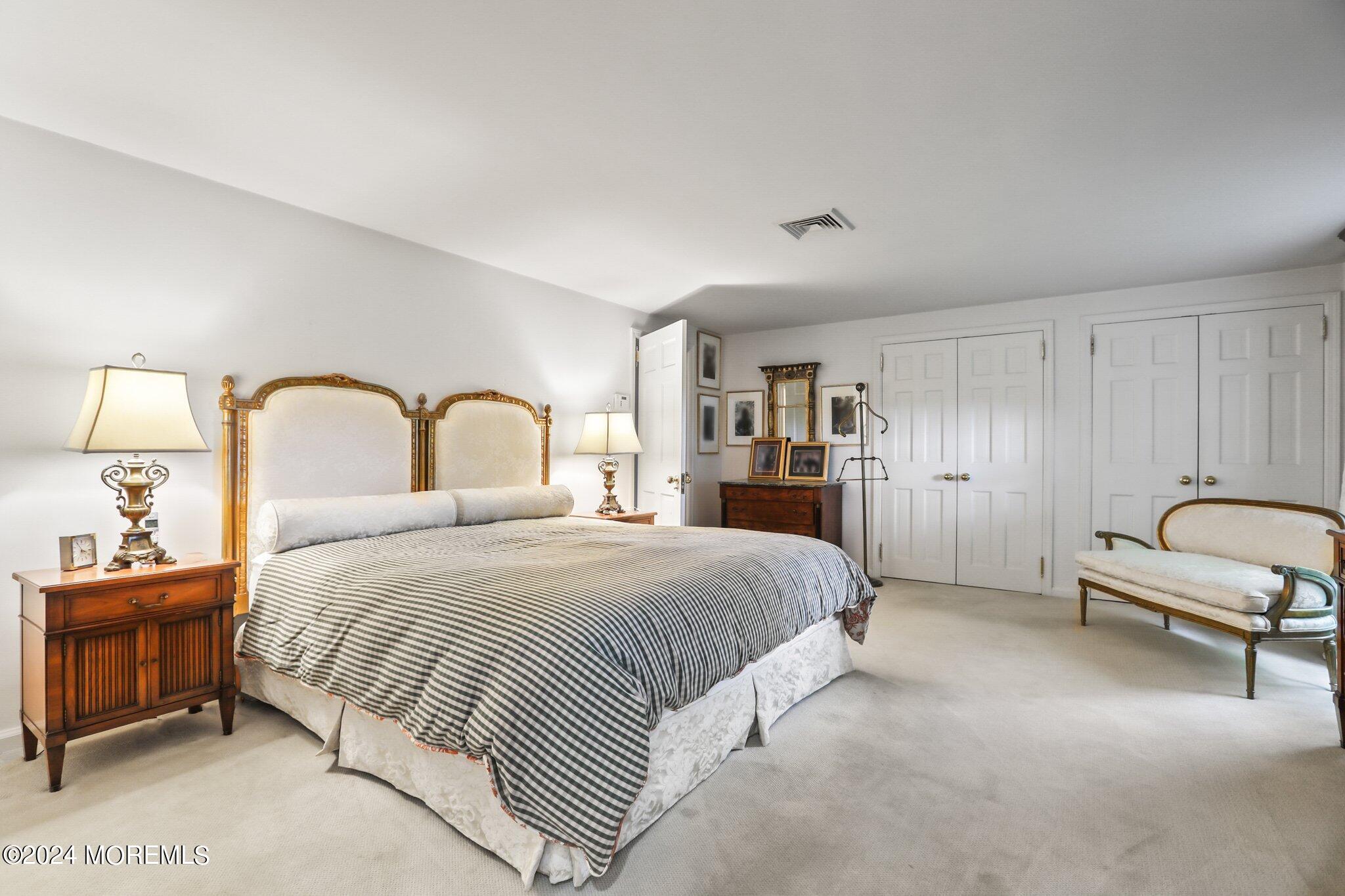 154 Rumson Road Rumson, NJ 07760 - Photo 23 of 38 a bedroom with a bed and a dresser