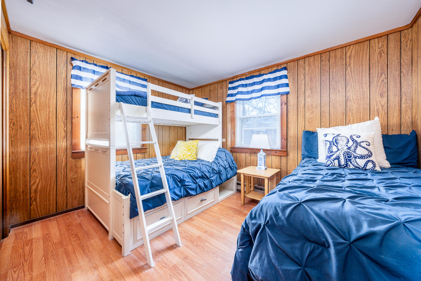 60 Long Avenue, Unit E Wellfleet, MA 02667 - Photo 12 of 22 a bedroom with two beds and window