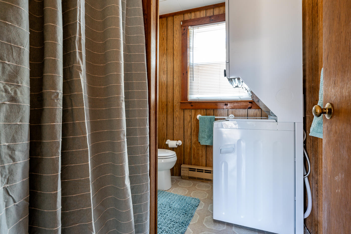 60 Long Avenue, Unit E Wellfleet, MA 02667 - Photo 14 of 22 a bathroom with a toilet and a shower