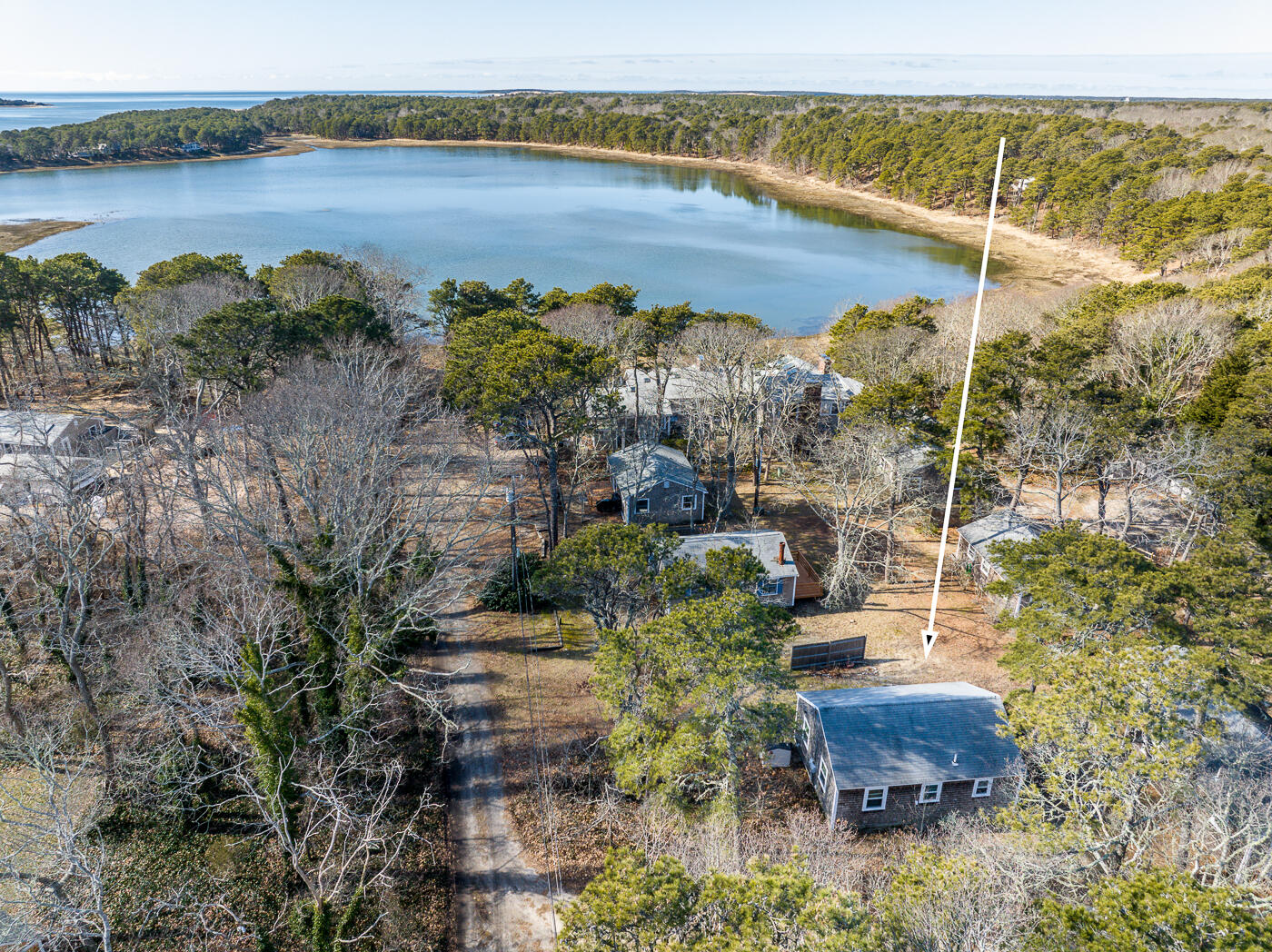 60 Long Avenue, Unit E Wellfleet, MA 02667 - Photo 18 of 22 a view of a lake from a balcony