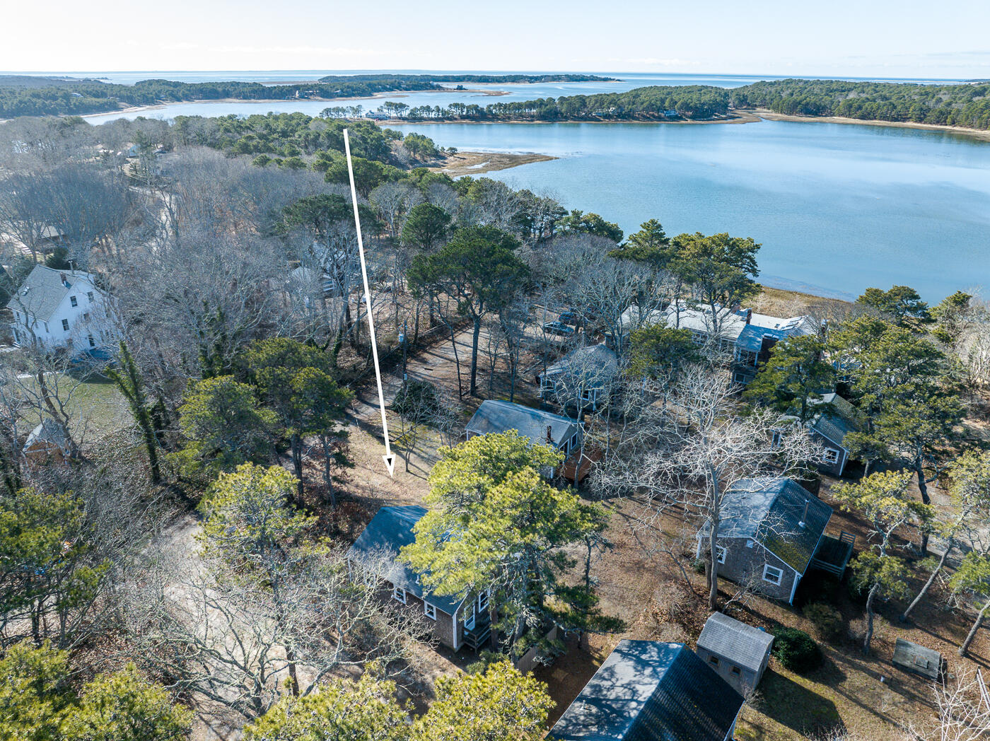 60 Long Avenue, Unit E Wellfleet, MA 02667 - Photo 19 of 22 a view of a lake with green space and mountain view