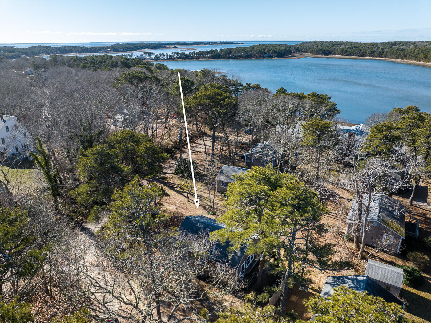 60 Long Avenue, Unit E Wellfleet, MA 02667 - Photo 21 of 22 a view of a lake from a yard
