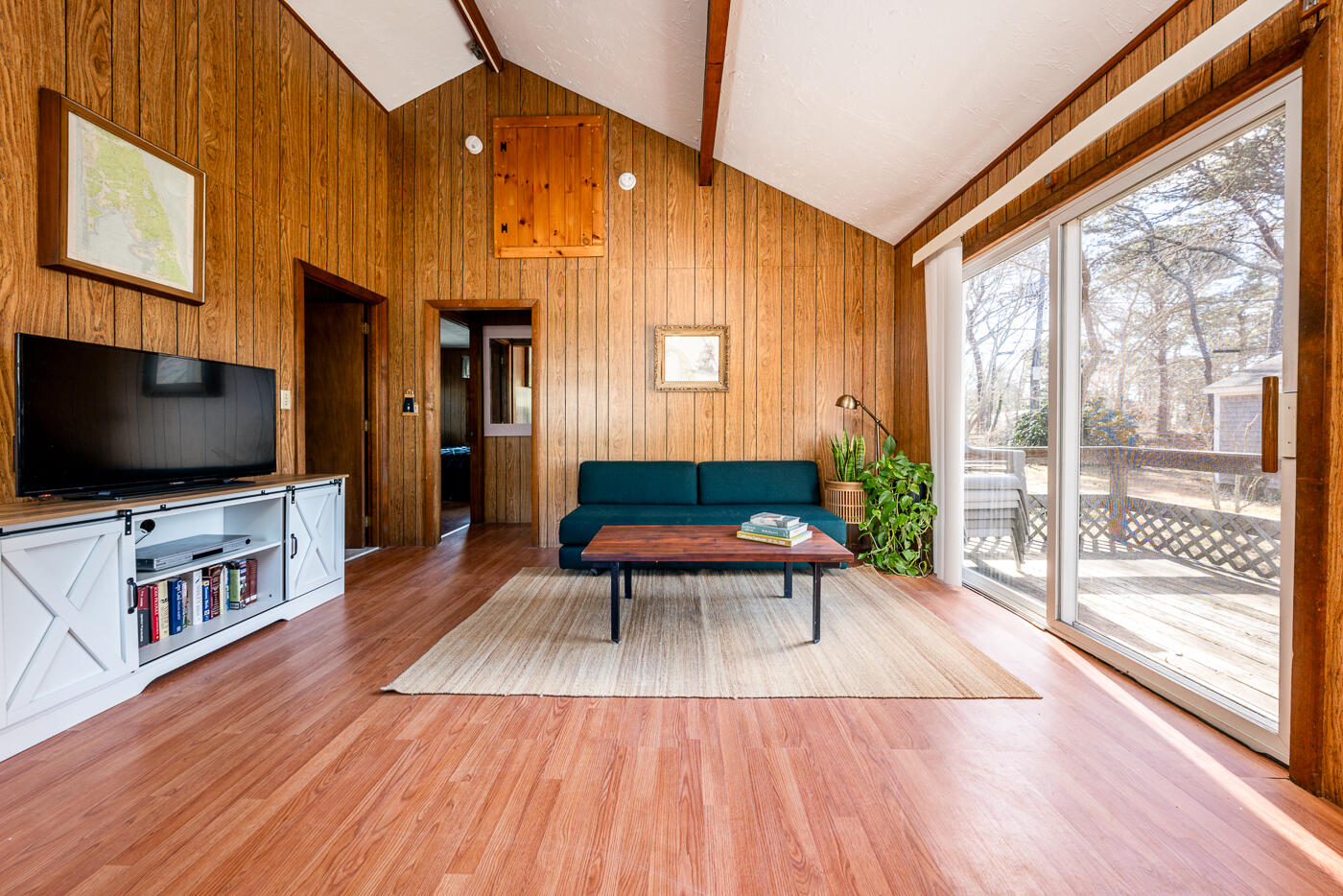 60 Long Avenue, Unit E Wellfleet, MA 02667 - Photo 4 of 22 a living room with furniture and a flat screen tv